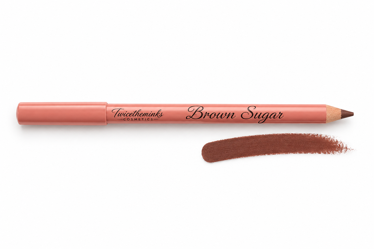 A creamy Brown Sugar Lip Liner rests beside a swatch of its rich brown shade on a white background, perfectly highlighting the smooth and blendable formula of this Twicetheminx Cosmetics product.